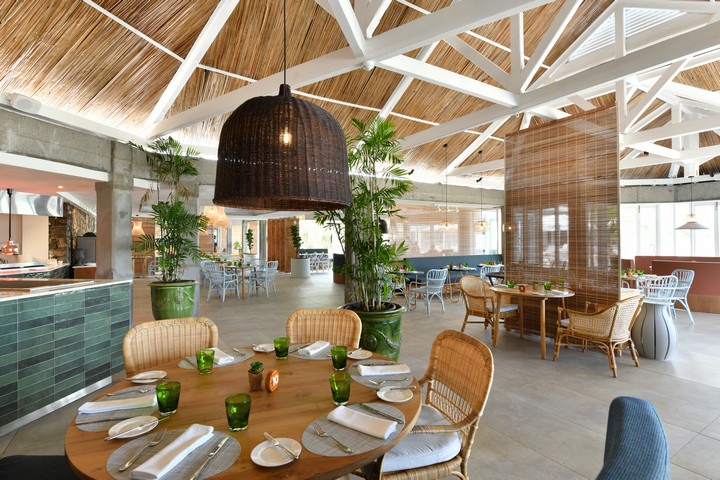 Dining area at Veranda Grand Baie with rustic decor and natural light