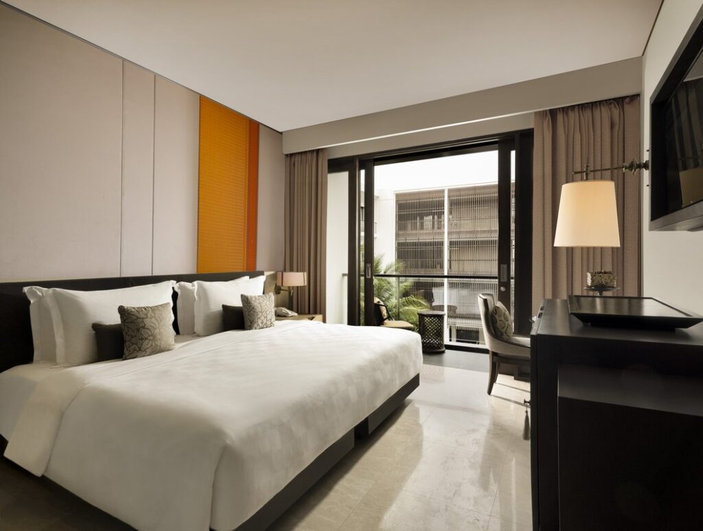 Elegant bedroom at The Anvaya Bali with a kingsize bed
