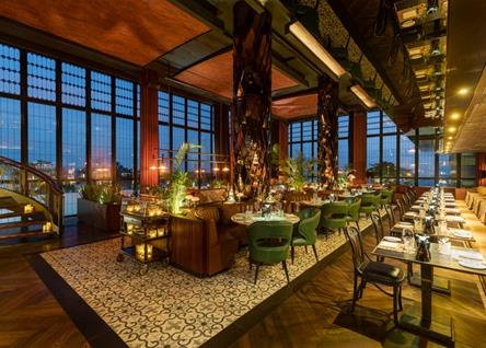 Elegant dining area at Double Six Seminyak with warm evening ambiance