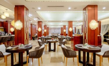 Elegant dining area at Savoy Seychelles with warm lighting