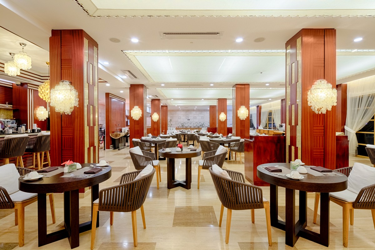 Elegant dining area at Savoy Seychelles with warm lighting