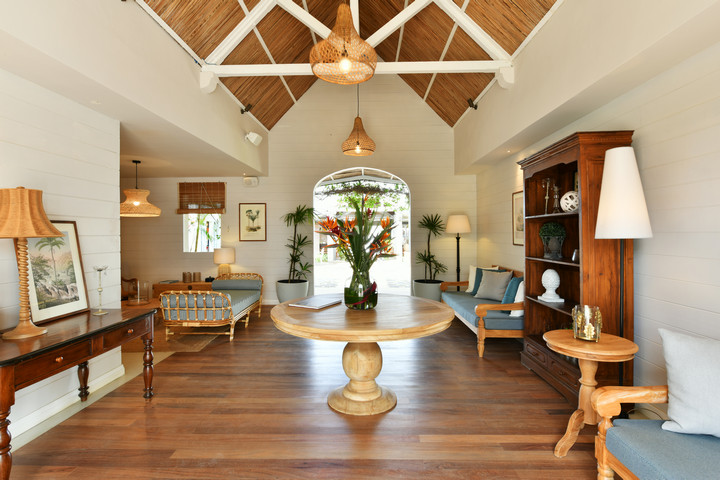 Elegant hotel lobby with wooden floors at Veranda Grand Baie