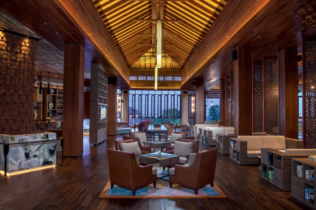 Elegant lobby lounge at MOVENPICK JIMBARAN with wooden interiors