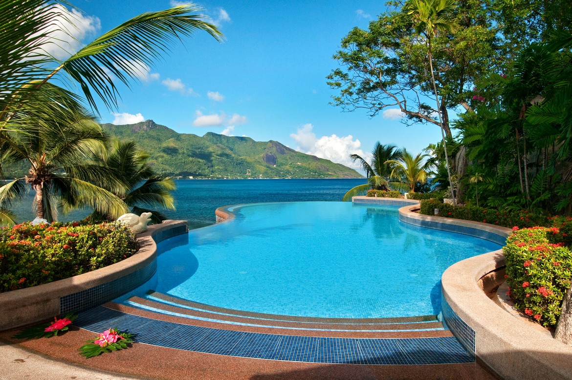 Hilton Seychelles Northolme Resort infinity pool with ocean and mountain views