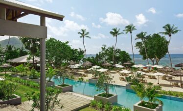Kempinski Seychelles Resort beachfront pool area with ocean views