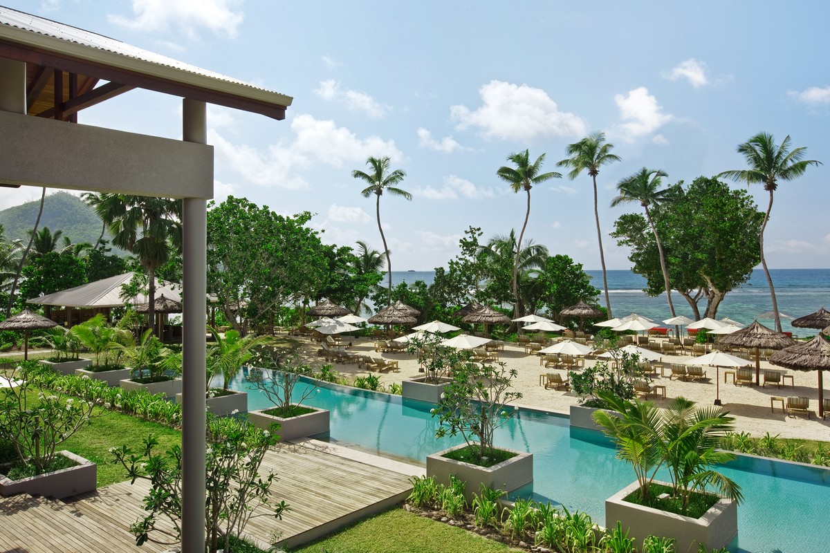 Kempinski Seychelles Resort beachfront pool area with ocean views