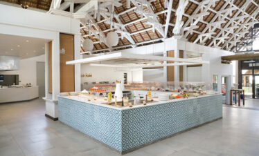 Lagoon Attitude Mauritius buffet area with modern decor and traditional roofing