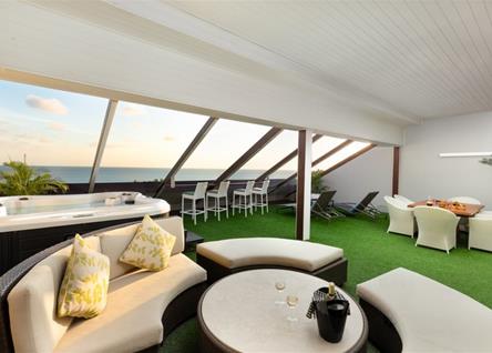 Luxury rooftop suite at Double Six Seminyak with private outdoor seating