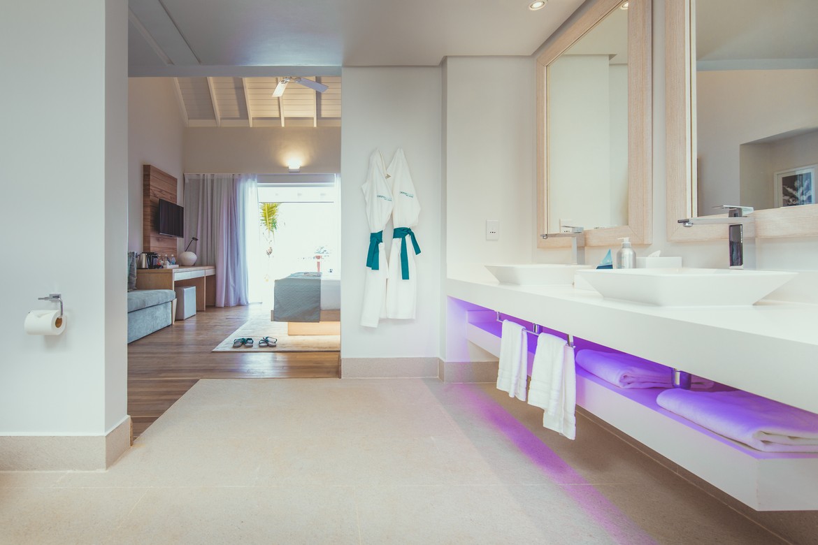 Modern bathroom inside Carana Beach Hotel villa