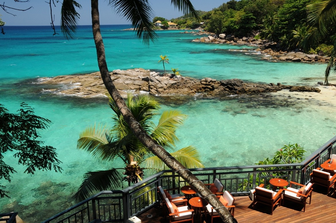 Oceanfront dining at Hilton Seychelles Northolme Resort overlooking the sea
