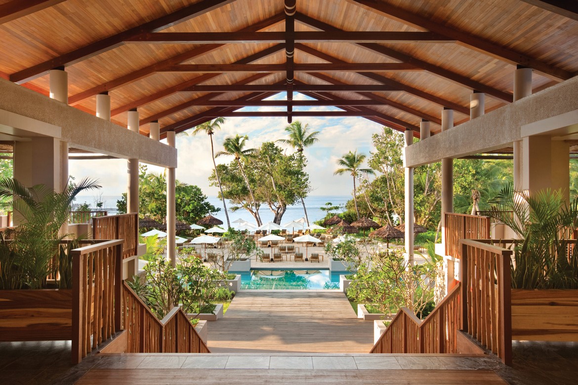 Open air lobby with ocean view at Kempinski Seychelles Resort
