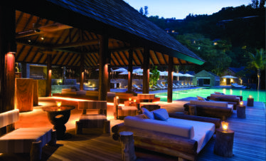 Outdoor lounge at Four Seasons Resort with poolside ambiance