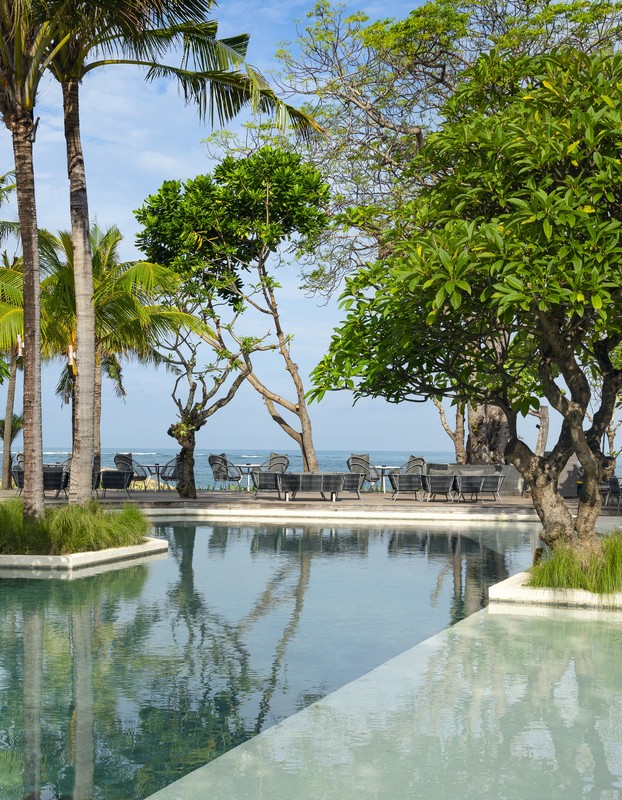 Poolside seating area at The Anvaya Bali