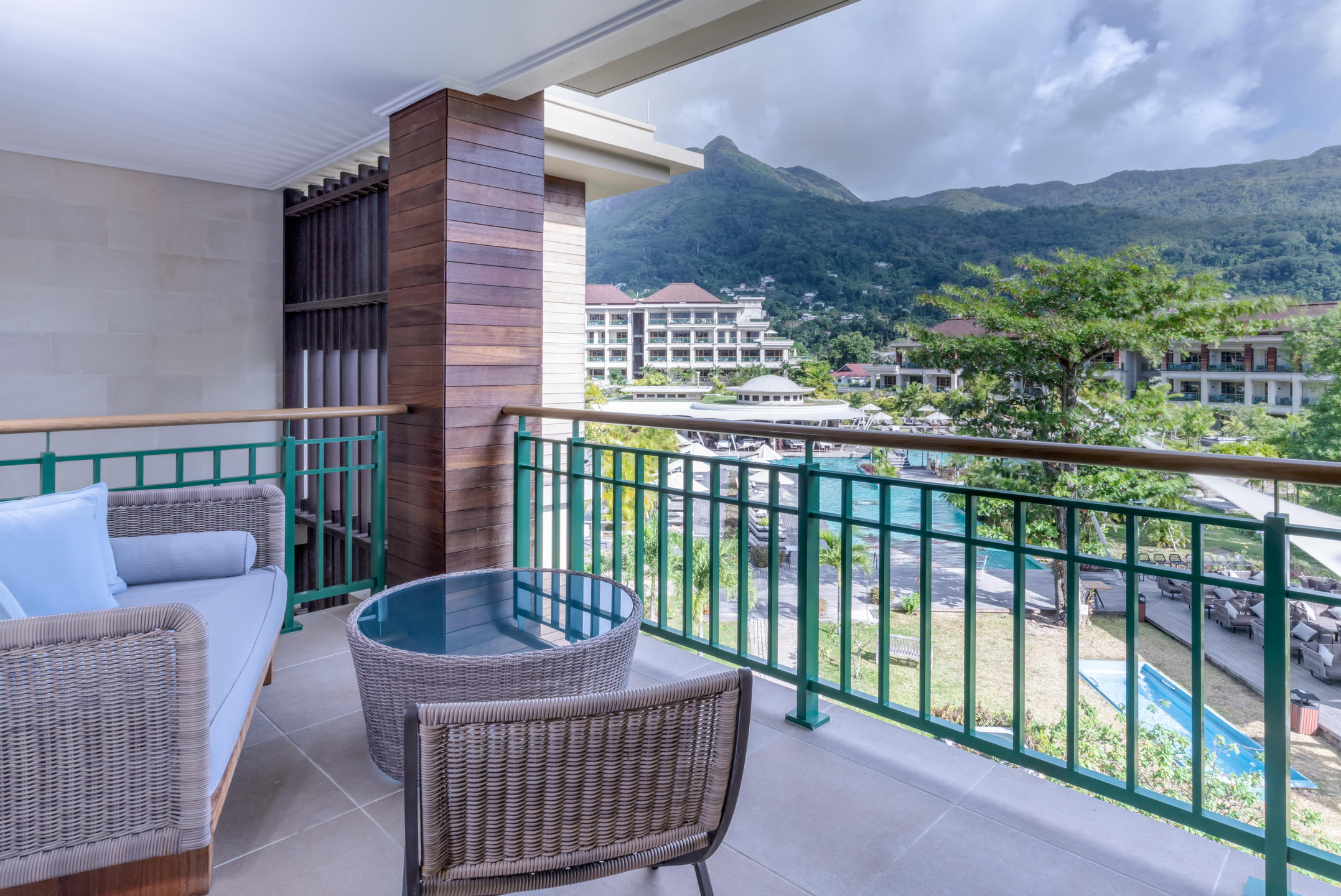Private balcony at Savoy Seychelles with resort and mountain views