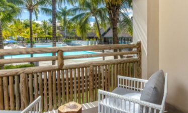 Private balcony with pool view at Lagoon Attitude Mauritius