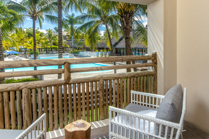 Private balcony with pool view at Lagoon Attitude Mauritius