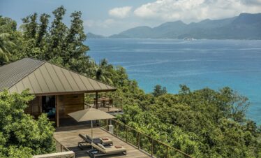 Private deck at Four Seasons Resort with sun loungers
