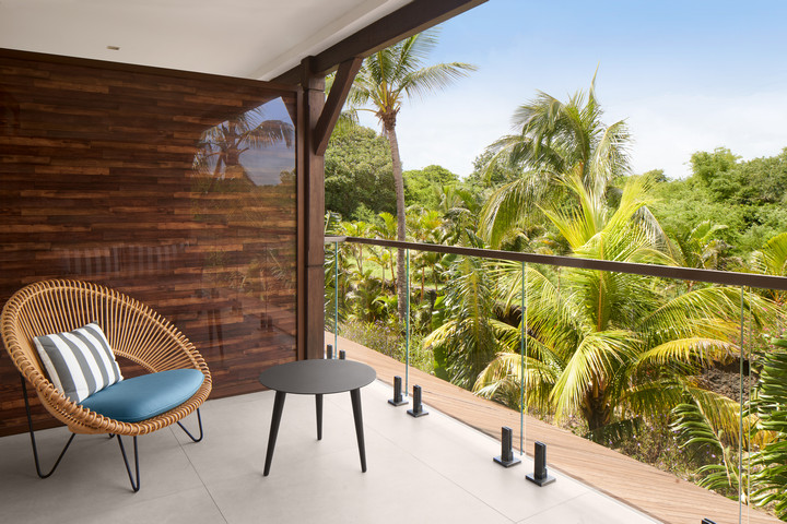 Relaxing balcony view of lush greenery at Nirvana at Le Meridien Ile Mauritius
