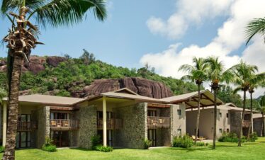 Rock formations and room exterior at Kempinski Seychelles Resort