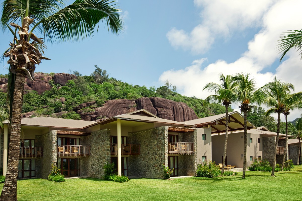 Rock formations and room exterior at Kempinski Seychelles Resort