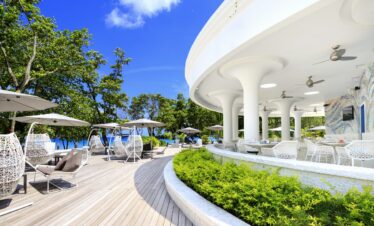 Savoy Seychelles oceanfront bar with modern white decor