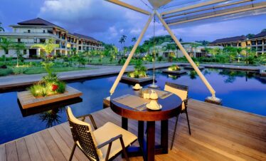 Savoy Seychelles poolside dining with a serene evening view
