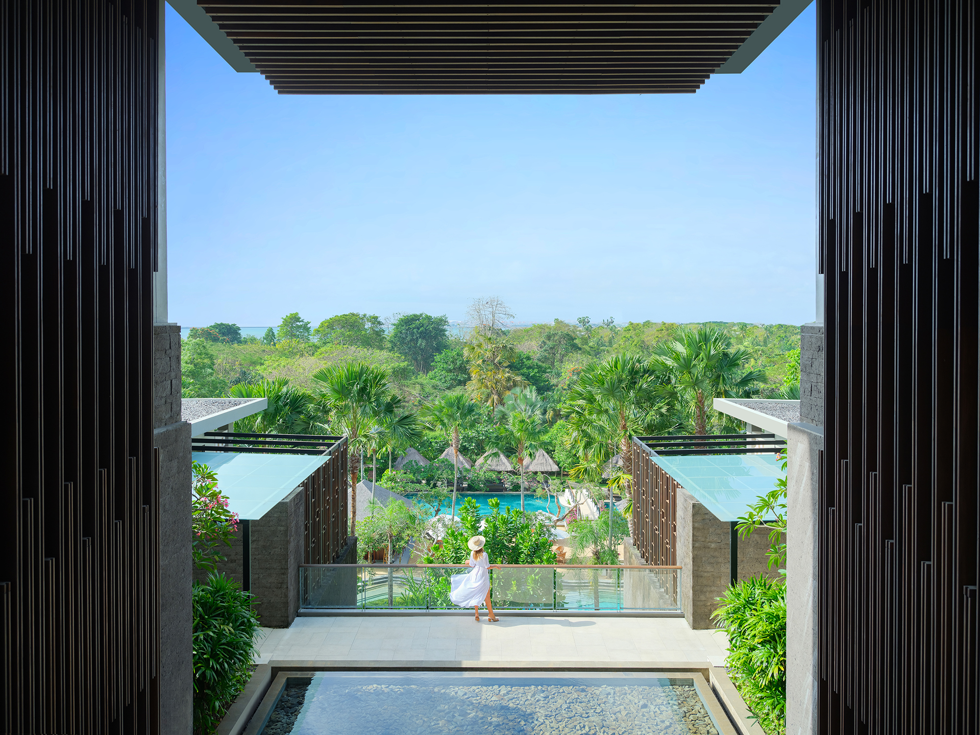 Scenic balcony at MOVENPICK JIMBARAN overlooking lush tropical gardens