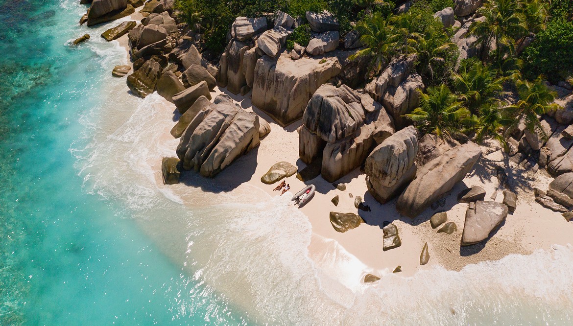 Secluded beach with giant rocks near Raffles Praslin