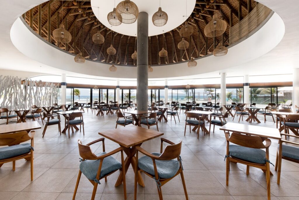 Spacious dining area at Radisson Blu Poste Lafayette with ocean views