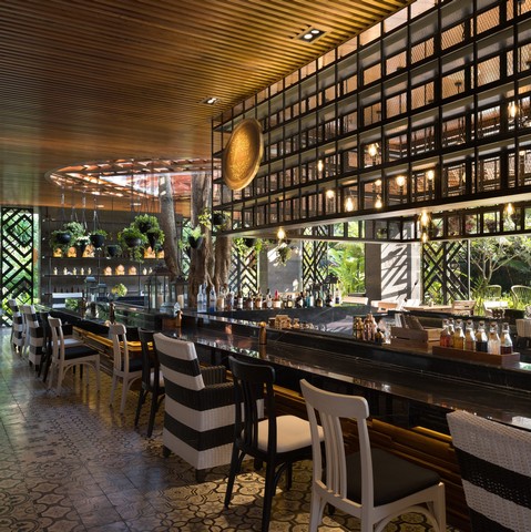 Stylish bar at INDIGO SEMINYAK with warm lighting and elegant decor