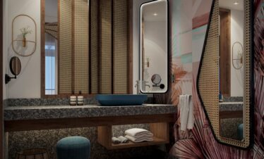 Stylish bathroom at Canopy by Hilton with unique mirrors and decor