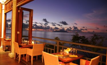 Sunset dining at Hilton Seychelles Northolme Resort open air restaurant