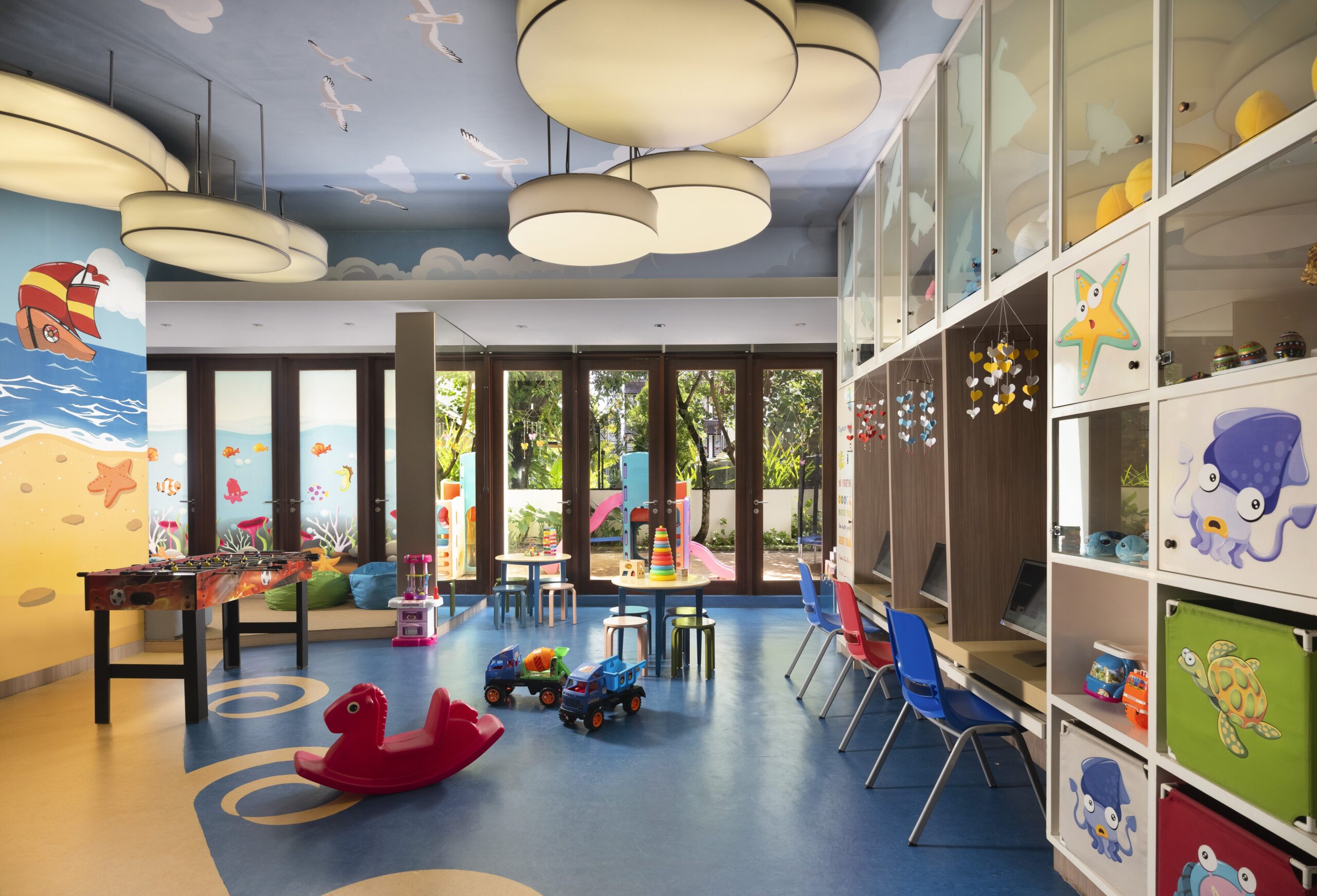 The Anvaya Bali kids club with colorful toys and playful murals