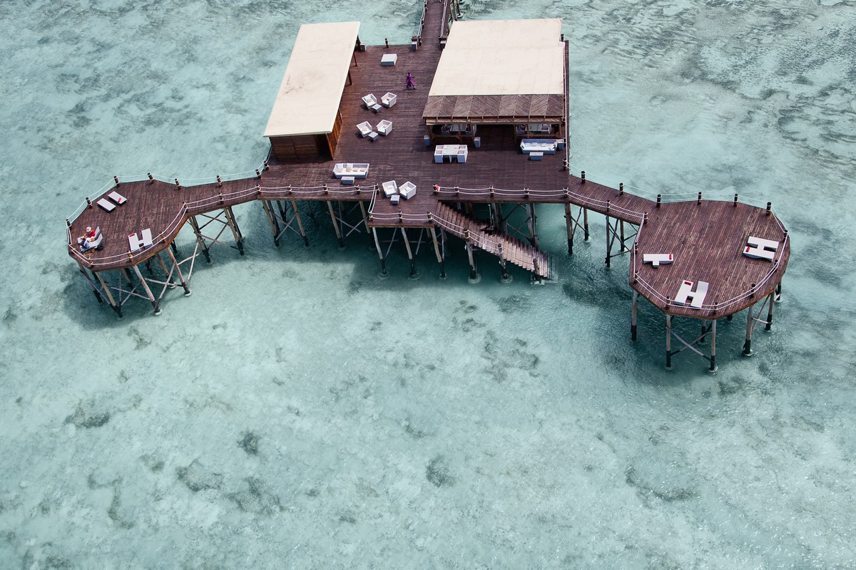 Aerial view of the jetty at Essque Zalu Zanzibar over turquoise waters