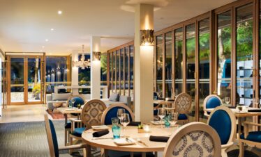 Elegant dining at Melia Zanzibar with stylish decor and ocean views