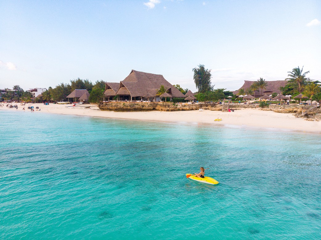 Kayaking in crystal waters near Sandies Baobab Beach Resort beachfront