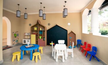 Kids playroom with colorful tables and chairs at Tui Blue Bahari