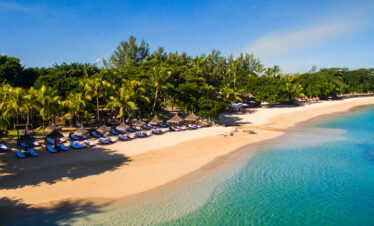 Maritim Resort white sandy beach lined with sun loungers