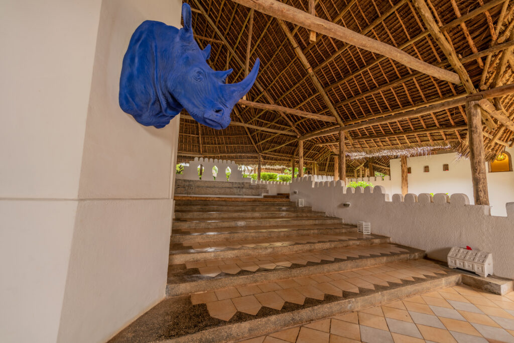 Open air lobby at Diamonds Mapenzi Beach Resort featuring unique decor