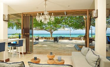 Open air lounge at Melia Zanzibar with a sea view and cozy seating