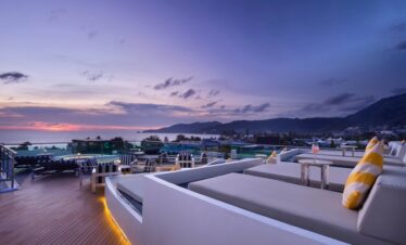 Rooftop bar at The Kee Resort with sunset views