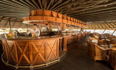 Rustic bar at Maritim Resort with oceanfront seating