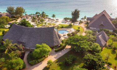 Sandies Baobab Beach Resort aerial view of lush gardens and beachfront villas