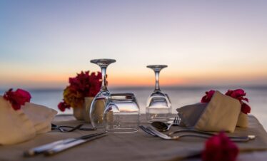 Sandies Baobab Beach Resort romantic sunset dining with oceanfront views