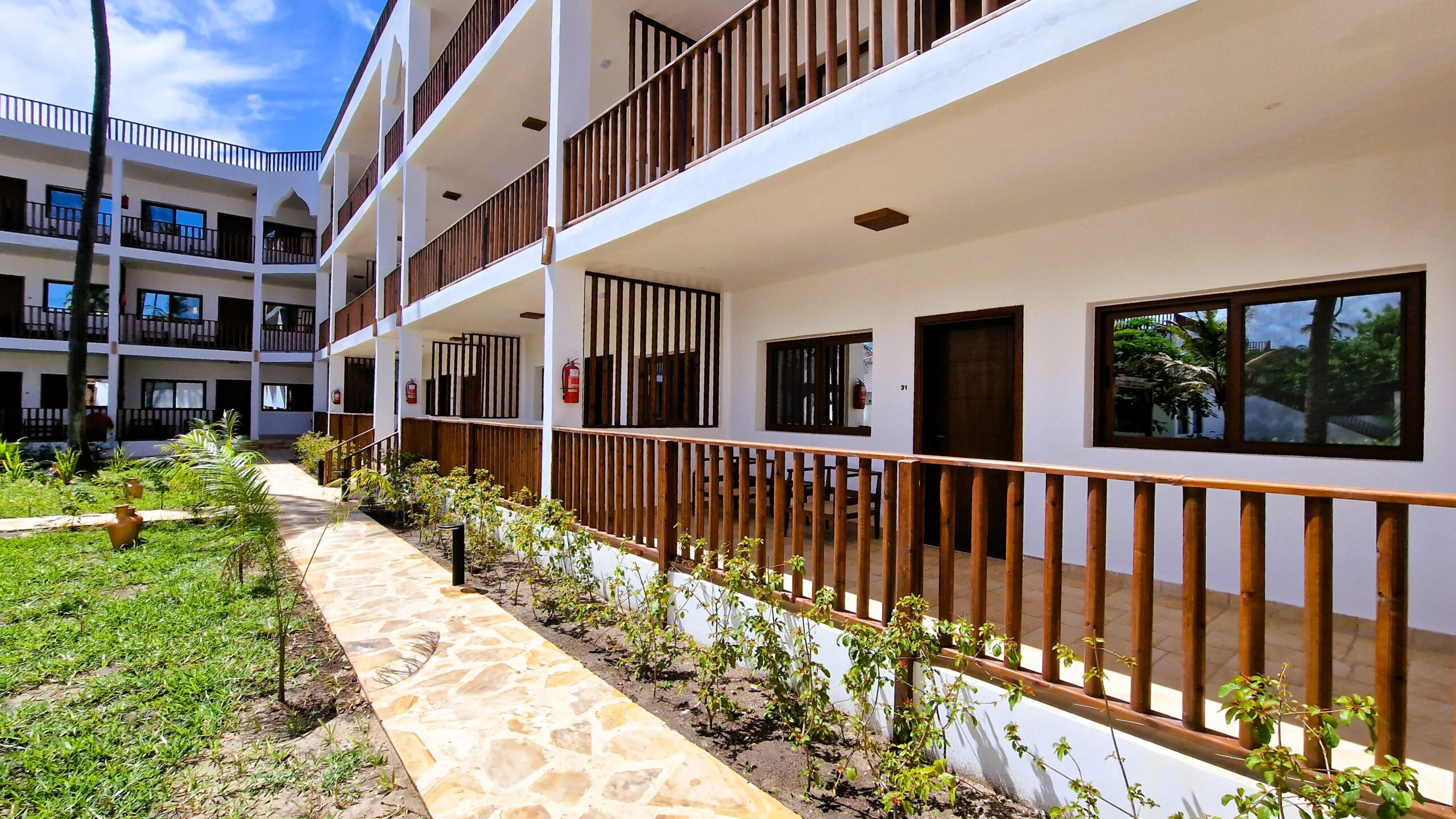 Spacious balconies at Dream of Zanzibar overlooking lush gardens