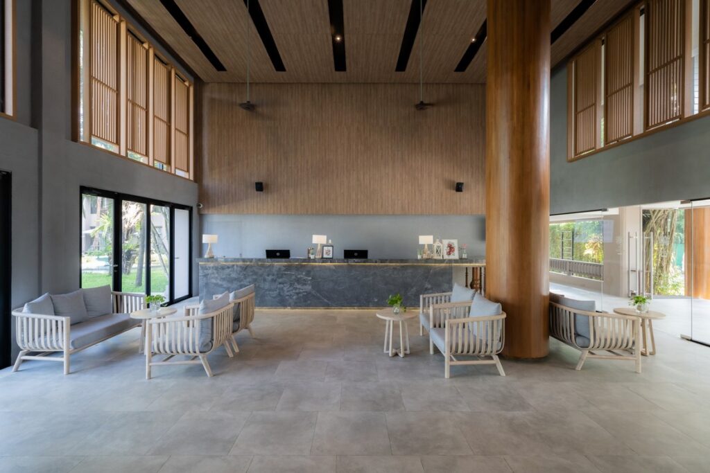 Spacious lobby with modern seating and a welcoming atmosphere at La Flora Khao Lak