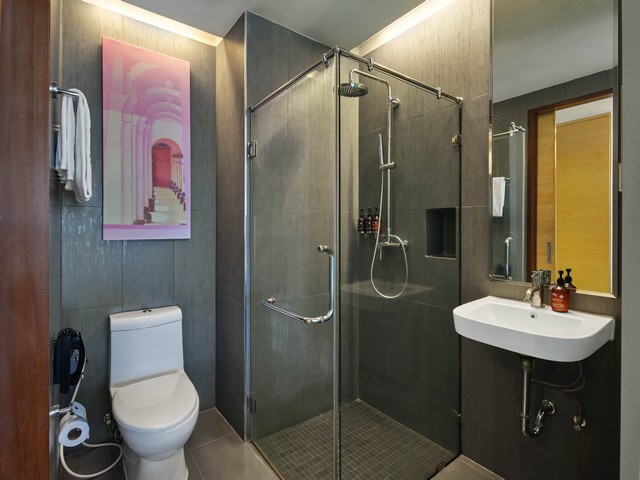 Stylish bathroom at The Kee Resort with glass shower