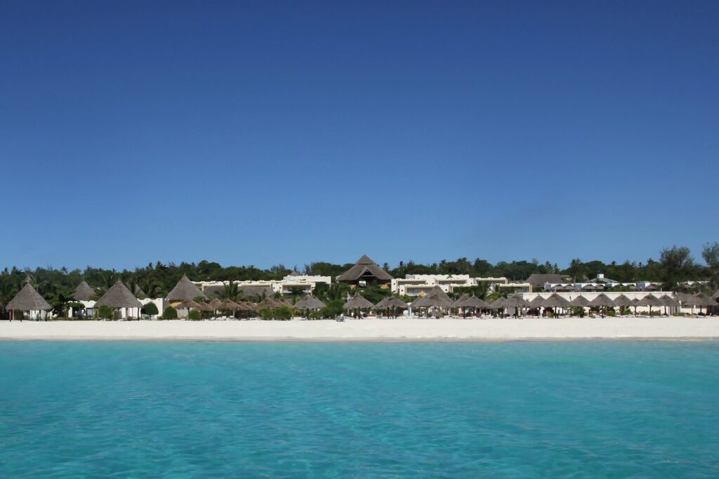 The stunning beachfront view of Gold Zanzibar with azure waters and white sands