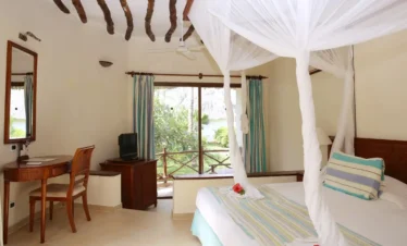 Bright suite interior at Sultan Sands Zanzibar