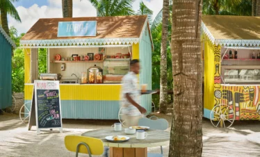 Colorful beach shack near Ravenala Attitude hotel
